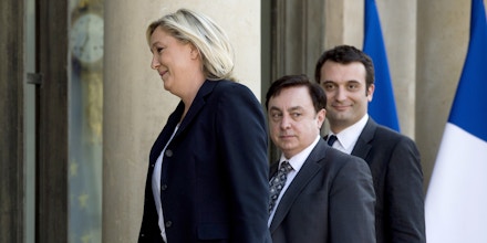 French far-right Front National (FN) party president Marine Le Pen (L), FN vice-presidents Jean-Fran?ois Jalkh (C) and Florian Philippot, arrive at the Elysee Palace for a meeting with French President on May 16, 2014 in Paris.   AFP PHOTO / ALAIN JOCARD        (Photo credit should read ALAIN JOCARD/AFP/Getty Images)