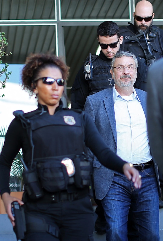 Antonio Palocci, a former Brazilian finance minister and senior figure in the last two governments, is pictured upon arriving under police escort at the Forensic Medicine Institute in Curitiba, in southern Brazil, on September 26, 2016, after being arrested in Sao Paulo for his alleged involvement in the huge Petrobras pay-to-play scandal.Brazilian police on Monday arrested Palocci, as part of the Petrobras corruption probe, prosecutors said. Palocci, 55, served as finance minister under former president Luiz Inacio Lula da Silva and as chief of staff for his successor Dilma Rousseff, who was impeached this month. Palocci was also a key figure in the leftist Workers' Party. / AFP / Heuler Andrey (Photo credit should read HEULER ANDREY/AFP/Getty Images)