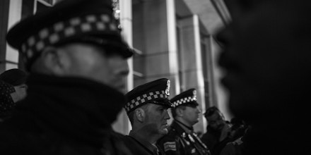 Upwards of 500 hundred people marched throughout downtown Chicago on Tuesday, November 24 to protest the police killing of Laquan McDonald at the hands of Chicago police officer Jason Van Dyke. McDonald was shot sixteen times and the video was withheld from public view until a judge ordred it released. McDonald was holding a small knife but was shot repeatedly in the dashcam video. The family was paid 5 million dollars in a settlement with the City of Chicago, but yesterday officer Van Dyke was also charged with murder after a whistleblower brought the video to the attention of a local journalist who then sued the city to have it released. The City of Chicago's Police Department has a long and difficult history associated with police brutality reaching back decades.