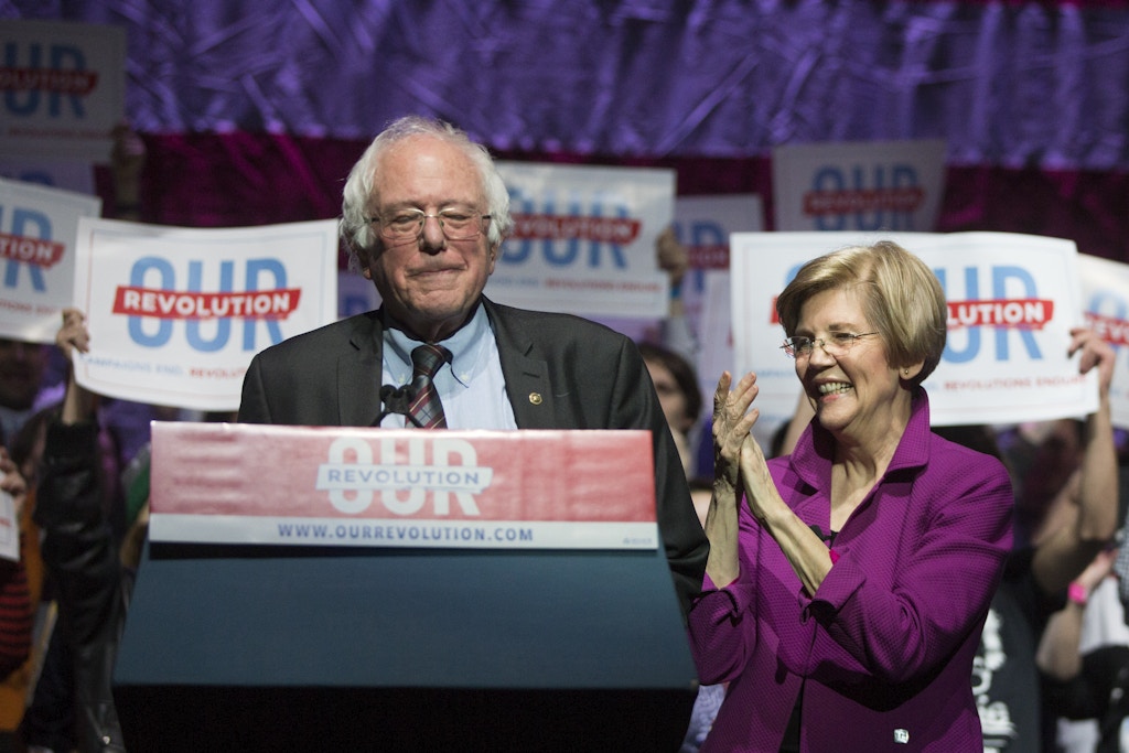 BOSTON, MA - MARCH 31: Vermont Senator and former Presidential candidate Bernie Sanders (I Ð VT) and Senator Elizabeth Warren (D-MA) speak at the Our Revolution Massachusetts Rally at the Orpheum Theatre on March 31, 2017 in Boston, Massachusetts. (Photo by Scott Eisen/Getty Images)
