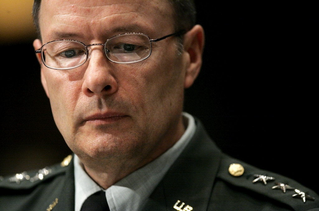 Army Lt. Gen. Keith Alexander, director of the National Security Agency, reviews his notes, while testifying on Capitol Hill in Washington, Tuesday, May 1, 2007, before the Senate Intelligence Committee. (AP Photo/Haraz N. Ghanbari)
