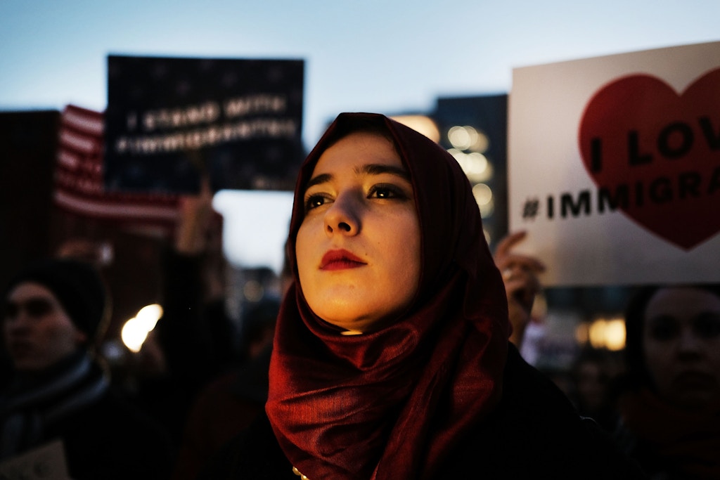 NEW YORK, NY - JANUARY 25: Hundreds of people attend an evening rally at Washington Square Park in support of Muslims, immigrants and against the building of a wall along the Mexican border on January 25, 2017 in New York City. President Donald Trump took actions today to start the building of a long promised wall along the Mexican border and to cut federal grants for immigrant protecting "sanctuary cities".  (Photo by Spencer Platt/Getty Images)