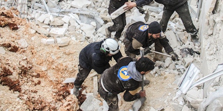 Syrian civil defence volunteers, known as the White Helmets, dig through the rubble of a mosque following a reported airstrike on a mosque in the village of Al-Jineh in Aleppo province on March 17, 2017.The US military says it carried out an air strike in northern Syria against an Al-Qaeda target, but denies deliberately targeting a mosque where dozens were killed according to the Syrian Observatory for Human Rights. / AFP PHOTO / Omar haj kadour (Photo credit should read OMAR HAJ KADOUR/AFP/Getty Images)