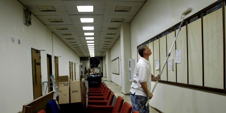 Larry Turner paints the walls as renovations of Legislative Plaza in Nashville, Tenn., continue Monday, Jan. 3, 2005. The bulletin boards under his paint roller will soon be filled with notices and schedules for various legislative committees that begins Jan. 11. (AP Photo/The Tennessean, George Walker IV)