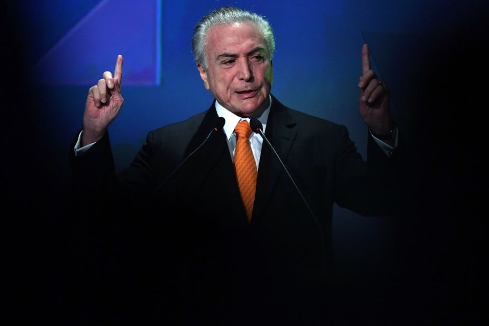 Brazilian President Michel Temer speaks during an Investment Forum in Sao Paulo, Brazil on May 30, 2017. / AFP PHOTO / NELSON ALMEIDA        (Photo credit should read NELSON ALMEIDA/AFP/Getty Images)