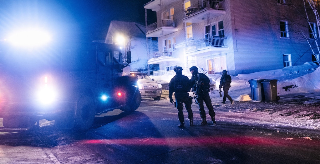 QUEBEC,CANADA - JANUARY 29: Canadian security forces patrol after a shooting in the Islamic Cultural Centre of Quebec in Quebec city on January 29, 2017. Five people are dead and a number of others wounded in a shooting at a mosque in Quebec City, the facility's president told media late Sunday. (Photo by Renaud Philippe/Anadolu Agency/Getty Images)