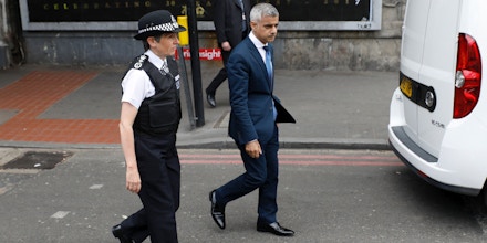 Mayor of London Sadiq Khan (R) and Metropolitan Police Commissioner Cressida Dick (L) walk together after visiting Borough High Street in London on June 5, 2017, the site of the June 3 terror attack, near to Borough Market.British police on Monday made several arrests in two dawn raids following the June 3 London attacks, claimed by the Islamic State group which left seven people dead. / AFP PHOTO / Odd ANDERSEN (Photo credit should read ODD ANDERSEN/AFP/Getty Images)