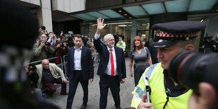 Britain's opposition Labour party Leader Jeremy Corbyn (C) waves as he leaves the Labour Party headquarters in central London on June 9, 2017 after results in a snap general election show a hung parliament with Labour gains and the Conservatives losing its majority.British Prime Minister Theresa May faced pressure to resign on Friday after losing her parliamentary majority, plunging the country into uncertainty as Brexit talks loom. The pound fell sharply amid fears the Conservative leader will be unable to form a government and could even be forced out of office after a troubled campaign overshadowed by two terror attacks. / AFP PHOTO / Daniel LEAL-OLIVAS (Photo credit should read DANIEL LEAL-OLIVAS/AFP/Getty Images)