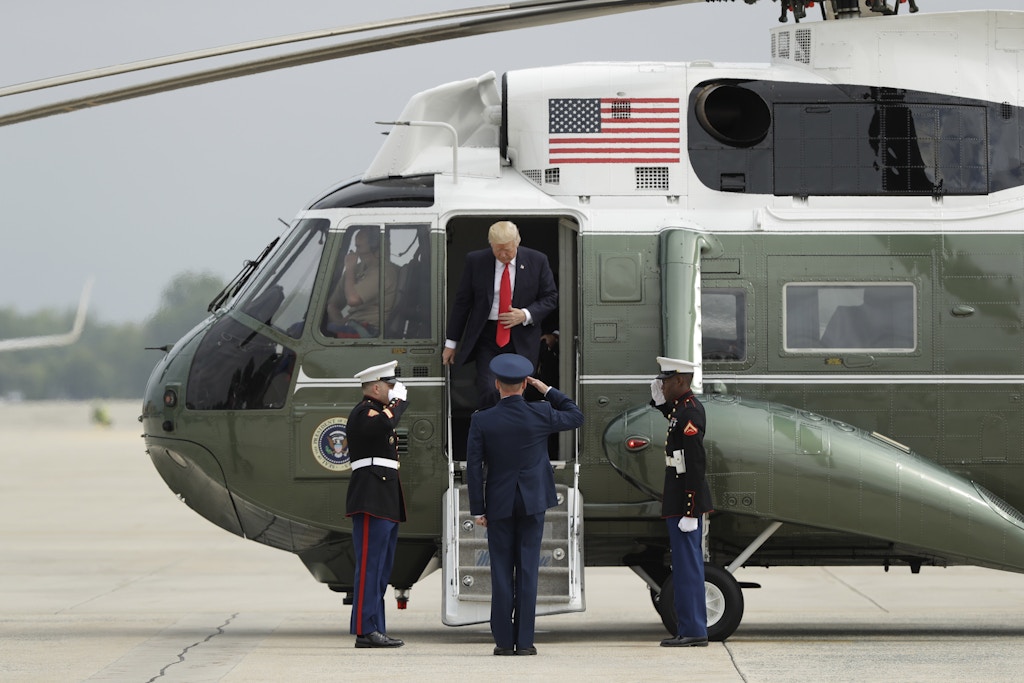 President Donald Trump gets off Marine One before boarding Air Force One for a speech in Miami on Cuba policy, Friday, June 16, 2017, at Andrews Air Force Base, Md. (AP Photo/Evan Vucci)