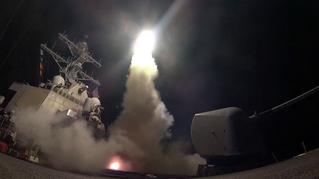 FILE - In this Friday, April 7, 2017 file image provided by the U.S. Navy, the guided-missile destroyer USS Porter (DDG 78) launches a tomahawk land attack missile in the Mediterranean Sea as the United States blasted a Syrian air base with a barrage of cruise missiles in fiery retaliation for a gruesome chemical weapons attack against civilians earlier in the week. North Korea has vowed to bolster its defenses to protect itself against airstrikes like the ones President Donald Trump ordered against an air base in Syria. The North called the airstrikes "absolutely unpardonable" and said it proves that its nuclear weapons are justified to protect the country against Washington's "evermore reckless moves for a war." (Mass Communication Specialist 3rd Class Ford Williams/U.S. Navy via AP, File)