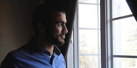 EDMONTON, AB - MAY 9:  Omar Khadr looks out the window of his home on May 9, 2015, two days after being freed after having spent nearly half of his life in custody.        (Michelle Shephard/Toronto Star via Getty Images)