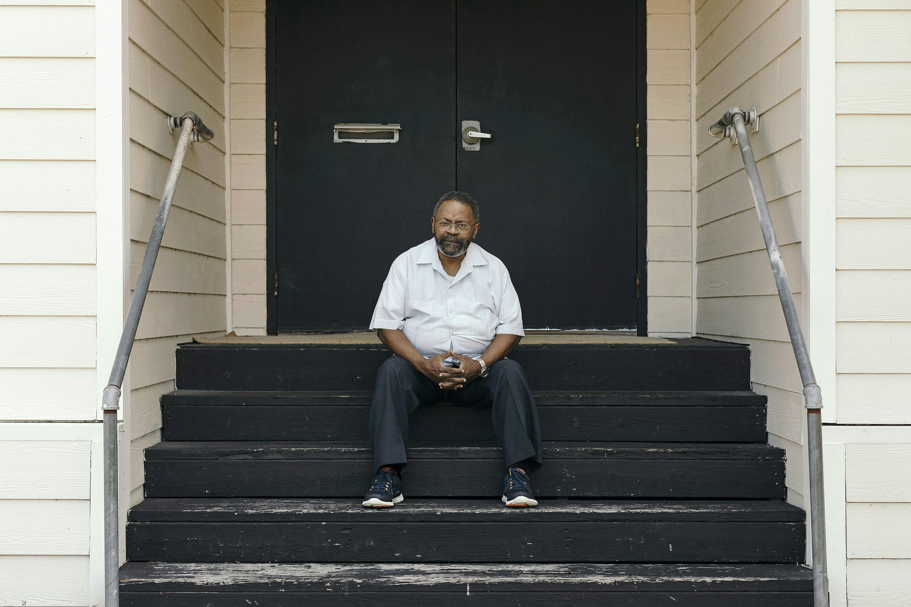 Reverend Roy L. Malveaux of Shining Star Baptist Church sits on the steps of his church, Tuesday, June 6th, 2017 in Beaumont, Texas.Todd Spoth for The Intercept
