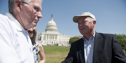 UNITED STATES – APRIL 16: Candidate for Senate and former Rep. Pete Hoekstra, R-Mich.,right, shakes hands with attendees at Herman Cain's Revolution on the Hill Tax Day Rally in Washington on MOnday, April 16, 2012. (Photo By Bill Clark/CQ Roll Call)