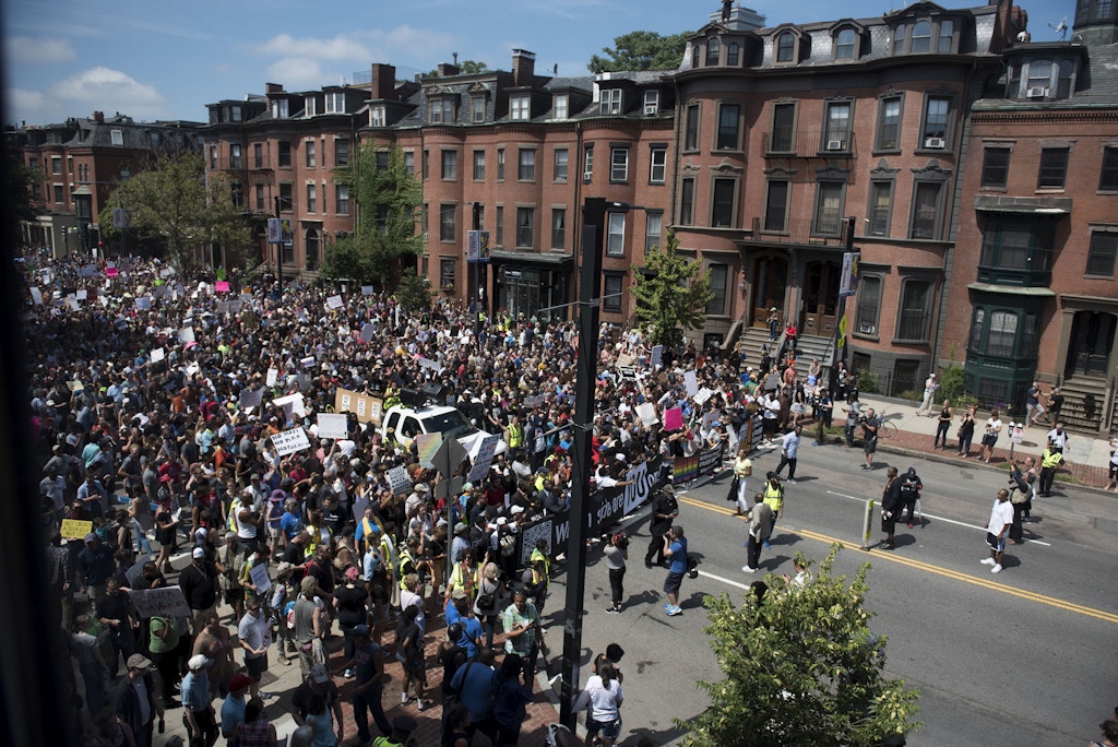 BOSTON - AUGUST 19: Marchers on the way toward the Boston Common during a march from Roxbury as part of a counterprotest to the Boston Free Speech rally on the Boston Common, Aug. 19, 2017. (Photo by Nicholas Pfosi for The Boston Globe via Getty Images)