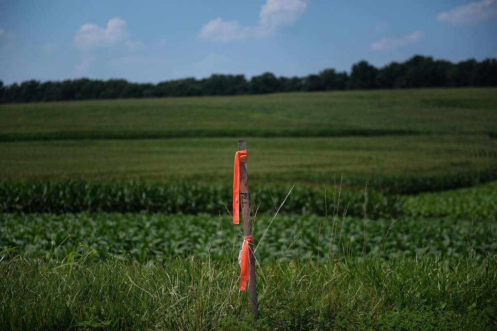 A post demarcating the proposed 50-foot-wide easement for the planned Atlantic Sunrise natural gas pipeline near Buck, Pennsylvania, July 17, 2017.