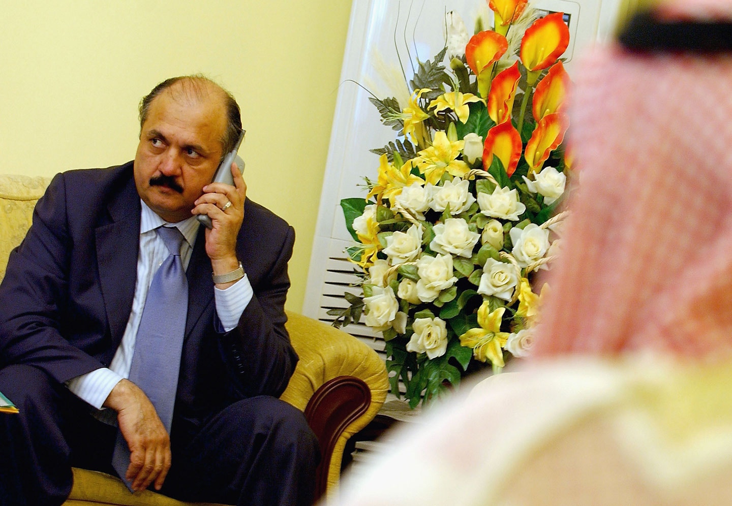 BAGHDAD, IRAQ - APRIL 2:  Sunni Arab member of Iraqi Transitional National Assembly (TNA) and a candidate for the post of parliament speaker Meshaan al-Jubouri speaks on the phone April 2, 2005 in Baghdad, Iraq. Iraqi Transitional National Assembly will hold its third-ever session on April 3, 2005 after it failed Tuesday to agree on a parliament speaker. The TNA tries to choose a Sunni Arab speaker for the assembly a step officials hope will quell the Sunni-led insurgency. (Photo by Wathiq Khuzaie/Getty Images)