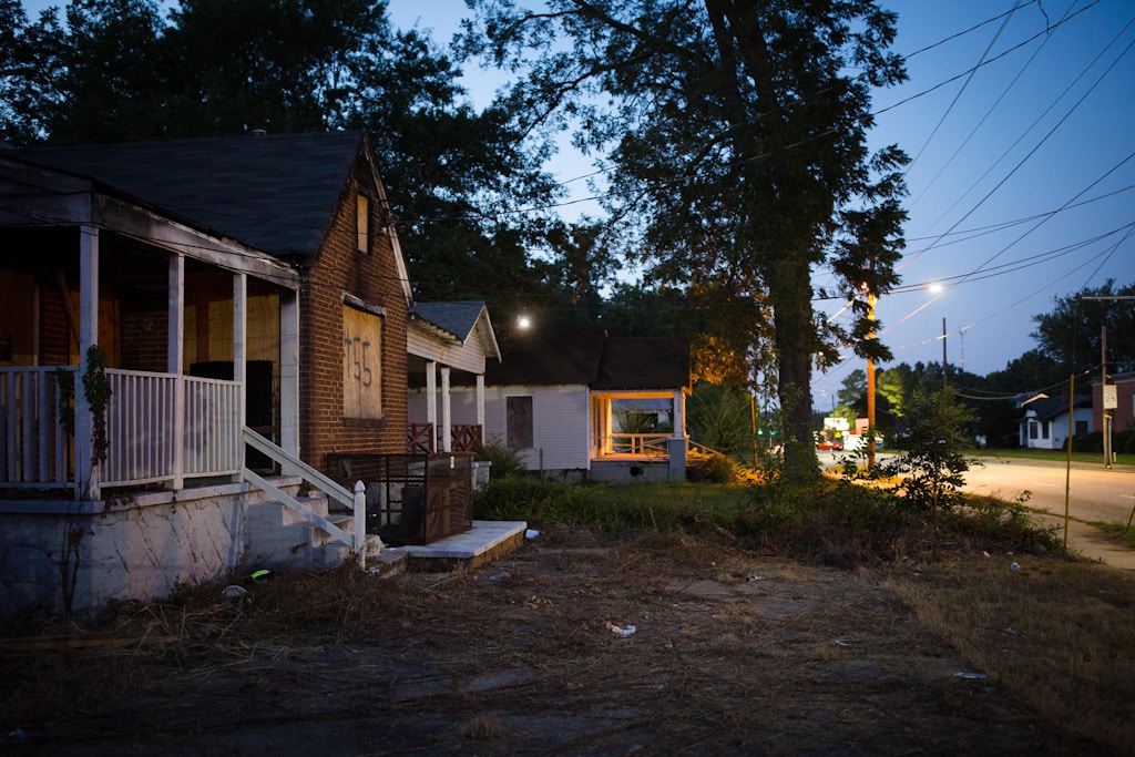 Boarded up homes at the intersection of Federal Terrace and Boulevard in southeast Atlanta on Saturday, Sept. 9, 2017. Photo by Kevin D. Liles for The Intercept