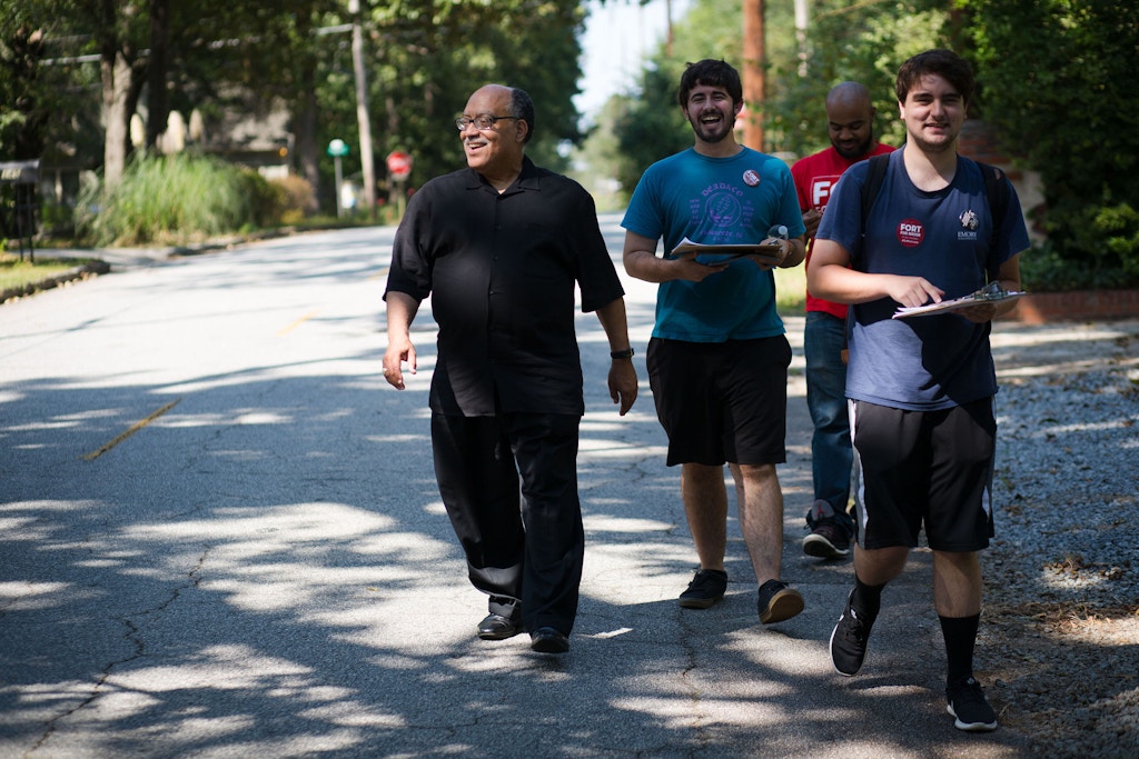 Vincent Fort (in black) and campaign workers canvass for votes in Atlanta on Saturday, Sept. 9, 2017. Fort is one of 12 candidates in a non-partisan race for Atlanta mayor. Photo by Kevin D. Liles for The Intercept
