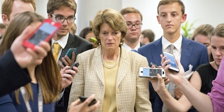 Lisa Murkowski is surrounded by reporters as she arrives in the US Capitol by the Senate Subway prior to the vote on the repeal of the Affordable Care Act Senate rejects repeal-only health care bill, Washington DC, USA - 26 Jul 2017 Affordable Care Act also known as 