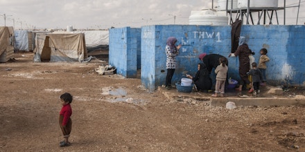 Syrian refugees are seen at the Zaatari  refugee camp, on the Jordanian border on 31 May 2017. It's the second refugee camp in the world . The field of Zaatari grows and spreads in the middle of nowhere. Of temporary solution to being the second largest refugee camp in the world and the fourth largest city in Jordan. Besieged by concertinas and guarded by the Jordanian army, the settlement currently accommodates 85,000 Syrian refugees, half of them children.  (Photo by Alvaro Fuente/NurPhoto via Getty Images)