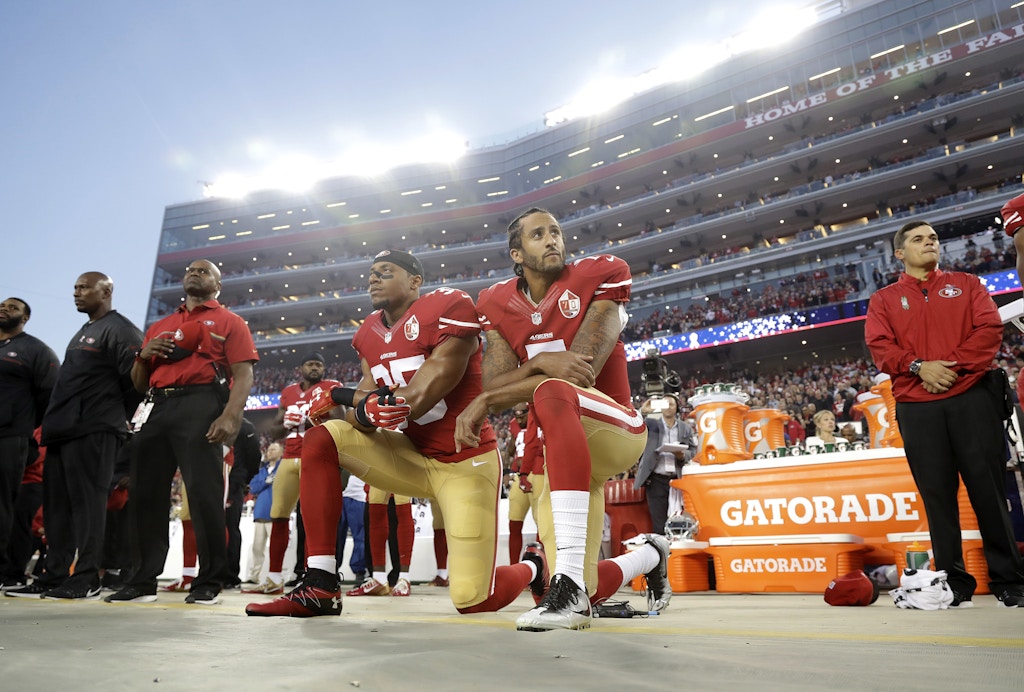 FILE - In this Sept. 12, 2016, file photo, San Francisco 49ers safety Eric Reid (35) and quarterback Colin Kaepernick (7) kneel during the national anthem before an NFL football game against the Los Angeles Rams in Santa Clara, Calif. What began more than a year ago with a lone NFL quarterback protesting police brutality against minorities by kneeling silently during the national anthem before games has grown into a roar with hundreds of players sitting, kneeling, locking arms or remaining in locker rooms, their reasons for demonstrating as varied as their methods. (AP Photo/Marcio Jose Sanchez, File)