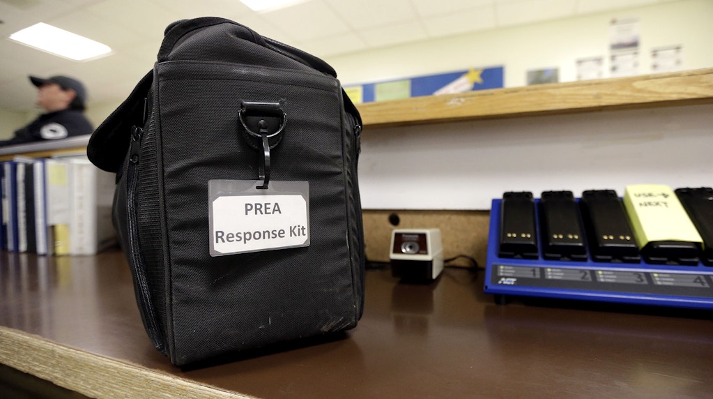 In this photo taken Oct. 17, 2014, a "PREA response kit," used to gather and preserve evidence in suspected sexual assaults, sits on an office counter at the Washington Corrections Center For Women in Gig Harbor, Wash. A 2003 federal law was meant to put a stop to sexual assault in the nation’s prisons, jails and juvenile detention centers and more than $110 million in state and federal taxpayer money has been spent to help states tackle the problem. By last fall, every state was supposed to have dozens of new standards in place, ranging from increased training of staff about sex abuse policies to procedures meant to help inmates safely report attacks. (AP Photo/Elaine Thompson)