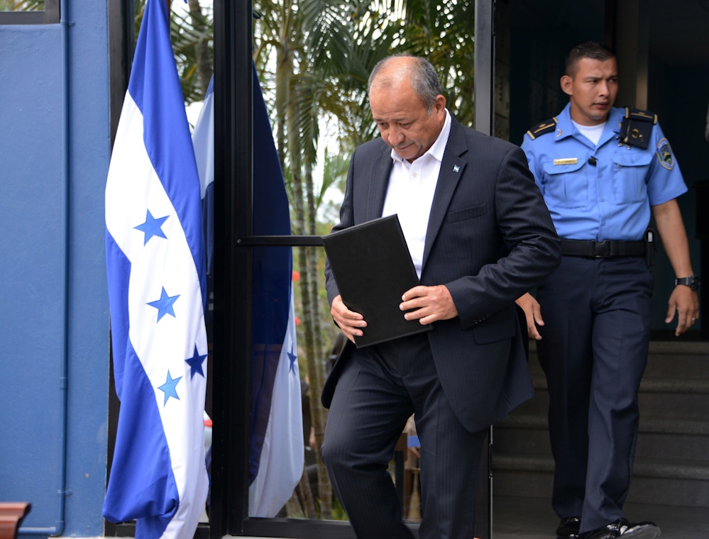Honduran Security Minister Julian Pacheco prepares to deliver a press conference in Tegucigalpa, on March 7, 2017. Pacheco denied on Tuesday the accusations made by a former Honduran drug lord currently being held in the United States, of collaborating with drug trafficking. / AFP PHOTO / ORLANDO SIERRA (Photo credit should read ORLANDO SIERRA/AFP/Getty Images)