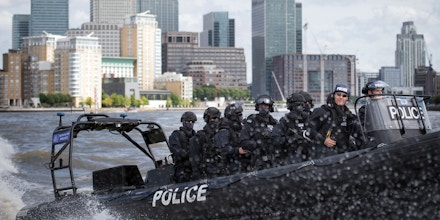 Armed Metropolitan Police counter terrorism officers take part in an exercise on the River Thames in London, Wednesday Aug. 3, 2016. London's police force is putting more armed officers on the streets 'to protect against the threat of terrorism.'' The increase in the number of officers follows attacks in France, Belgium and Germany.  (Stefan Rousseau/Pool Photo via AP)