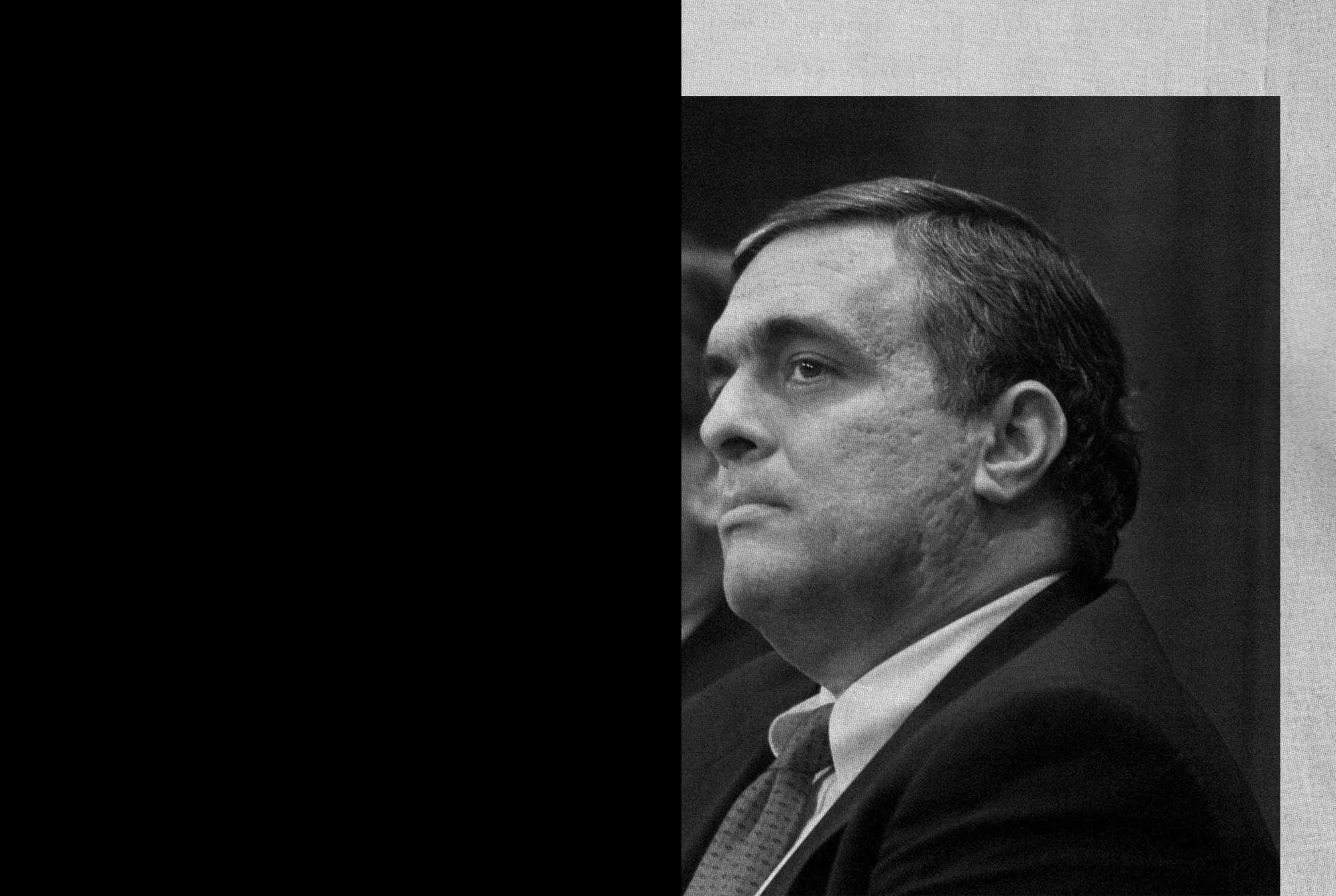 CIA Director George Tenet, right, accompanied by Attorney General John Ashcroft, looks on as FBI Director Louis Freeh, not shown, meets reporters at FBI headquarters in Washington Tuesday, Feb. 20, 2001 to discuss the arrest the FBI Agent Robert Philip Hanssen. (AP Photo/Rick Bowmer)