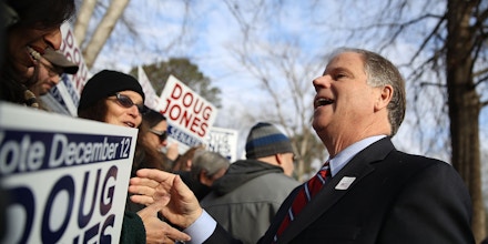 MOUNTAIN BROOK, AL - DECEMBER 12:  Democratic senatorial candidate Doug Jones greets supporters after voting at Brookwood Baptist Church on December 12, 2017 in Mountain Brook, Alabama. Doug Jones is facing off against Republican Roy Moore in a special election for U.S. Senate.  (Photo by Justin Sullivan/Getty Images)