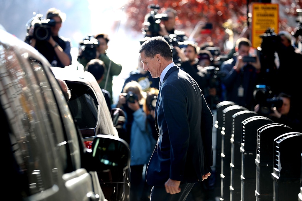 WASHINGTON, DC - DECEMBER 01:  Michael Flynn, former national security advisor to President Donald Trump, leaves following his plea hearing at the Prettyman Federal Courthouse December 1, 2017 in Washington, DC. Special Counsel Robert Mueller charged Flynn with one count of making a false statement to the FBI.  (Photo by Chip Somodevilla/Getty Images)
