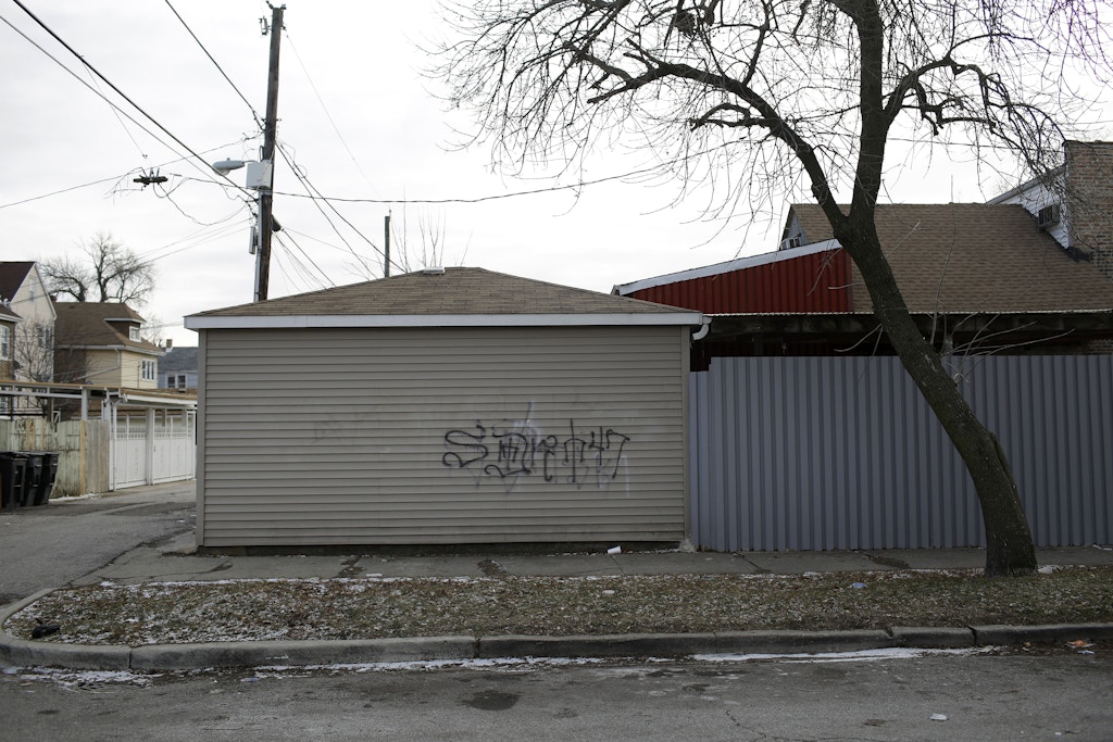 Gang graffiti is displayed on a garage of a home in the Back of the Yards neighborhood Thursday, January 11, 2018 in Chicago, Illinois. Chicago, Which is a sanctuary city has seen a number of U.S. Immigration and Customs Enforcement arrest across the city. Celene Adame's husband Wilmer Catalan-Ramirez was arrested by U.S. Immigration and Customs Enforcement after they showed up at his home last year in March. Catalan-Ramirez has been separated from his family and detained since his arrest. Photo by Joshua Lott for The Intercept