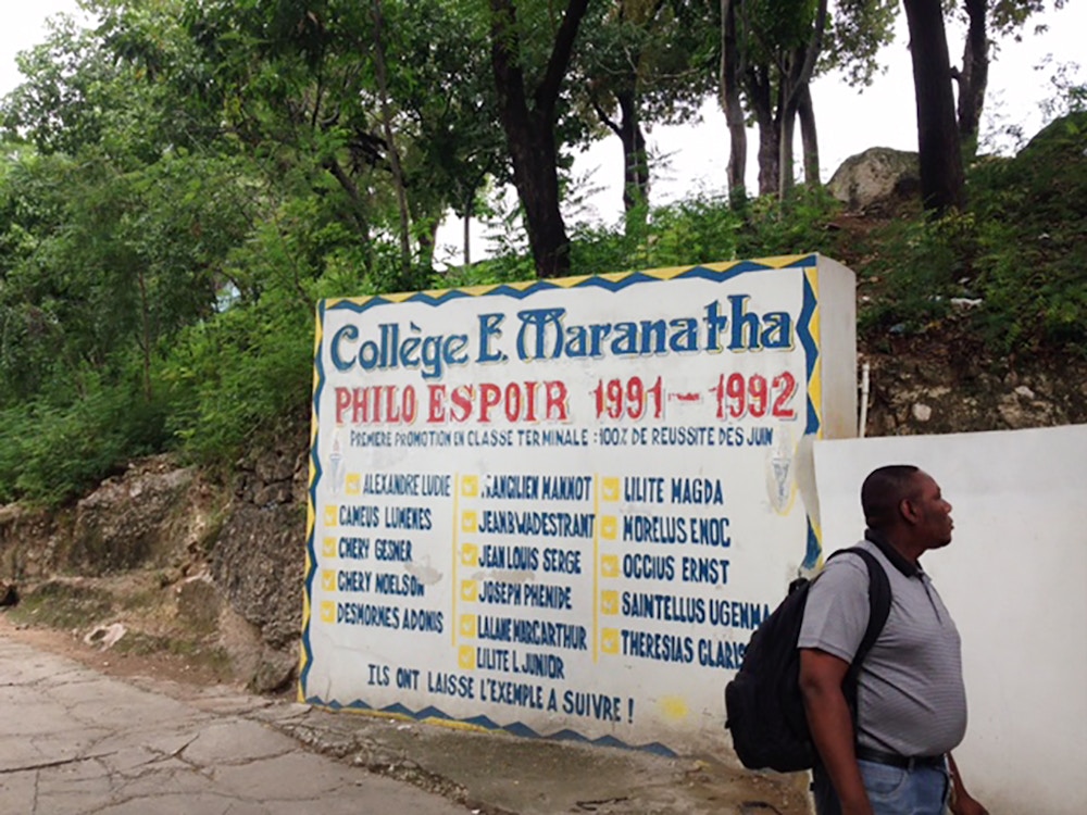 Main school logo inside the front gate and near entrance to courtyard on Maranatha campus in Port-au-Prince, on Nov. 17, 2017.