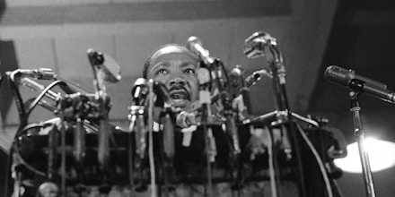 Dr. Martin Luther King, head of the Southern Christian Leadership Conference, delivers his speech that opened The National Conference for New Politico Convention in Chicago, Sept. 1, 1967. King, facing a battery of microphones, called for an end of the Vietnam fighting. (AP Photo/Charles Harrity)