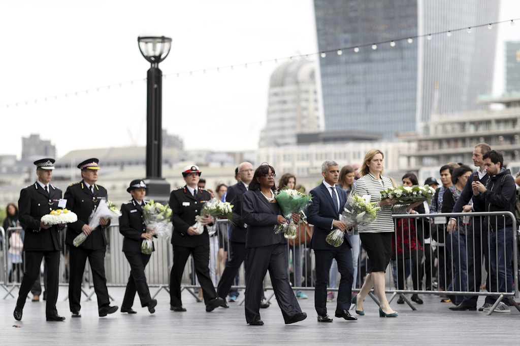 LONDON, ENGLAND - JUNE 05:  (L-R) Shadow Home Secretary Diane Abbott, Mayor of London Sadiq Khan and Home Secretary Amber Rudd take part in a vigil for the victims of the London Bridge terror attacks, in Potters Fields Park on June 5, 2017 in London, England. Seven people were killed and at least 48 injured in terror attacks on London Bridge and Borough Market on June 3rd. Three attackers were shot dead by armed police.  (Photo by Dan Kitwood/Getty Images)