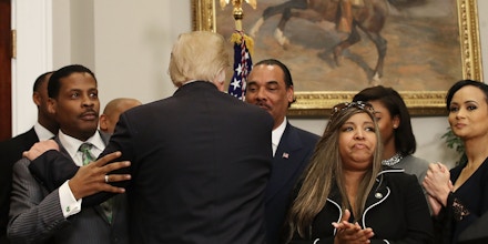 WASHINGTON, DC - JANUARY 12:  U.S. President Donald Trump greets members of the African American community after signing proclamation to honor Martin Luther King, Jr. day, in the Roosevelt Room at the White House, on January 12, 2018 in Washington, DC. Monday January 16 is a federal holiday to honor Dr. King and his legacy.  (Photo by Mark Wilson/Getty Images)