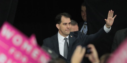 Wisconsin Governor Scott Walker greets guests at a Thank You Tour 2016 rally on December 13, 2016 in West Allis, Wisconsin. President-Elect Donald Trump and his running mate Mike Pence have been holding the rallies in several states recently to thank voters for electing them. (Photo by Scott Olson/Getty Images)
