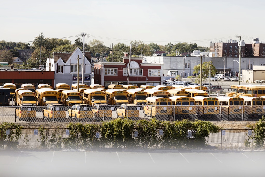 School buses sit in a parking lot in Hempstead, Long Island on Oct. 19, 2017.