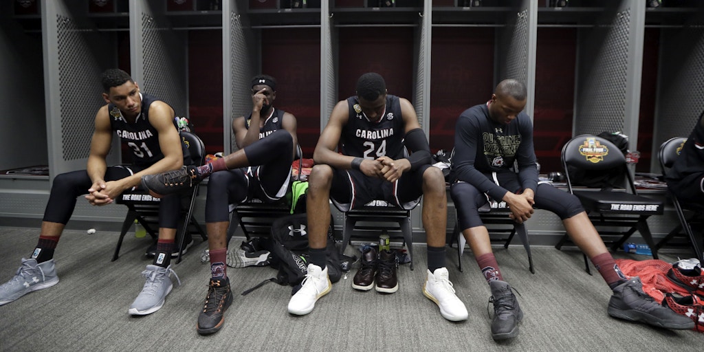 South Carolina players sit in the locker room after the semifinals of the Final Four NCAA college basketball tournament against Gonzaga, Saturday, April 1, 2017, in Glendale, Ariz. Gonzaga won 77-73. (AP Photo/Mark Humphrey)