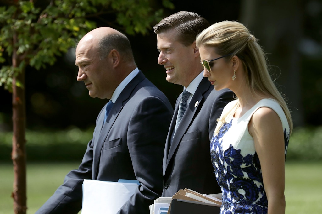 WASHINGTON, DC - AUGUST 30:  (L-R) National Economic Council Director Gary Cohn, White House Staff Secretary Rob Porter and Ivanka Trump walk across the South Lawn before departing the White House with U.S. President Donald Trump August 30, 2017 in Washington, DC. Trump is taking a day trip to Springfield, Missouri, to participate in a "tax reform kickoff event," according to the White House.  (Photo by Chip Somodevilla/Getty Images)