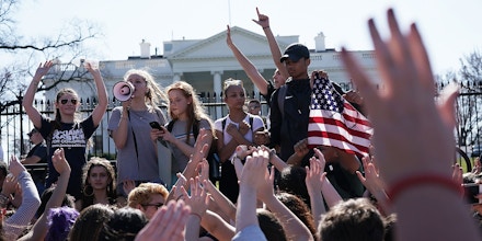 WASHINGTON, DC - FEBRUARY 21:  Students hold up their hands as they participate in a protest against gun violence February 21, 2018 outside the White House in Washington, DC. Hundreds of students from a number of Maryland and DC schools walked out of their classrooms and made a trip to the U.S. Capitol and the White House to call for gun legislation, one week after 17 were killed in the latest mass school shooting at Marjory Stoneman Douglas High School in Parkland, Florida.  (Photo by Alex Wong/Getty Images)