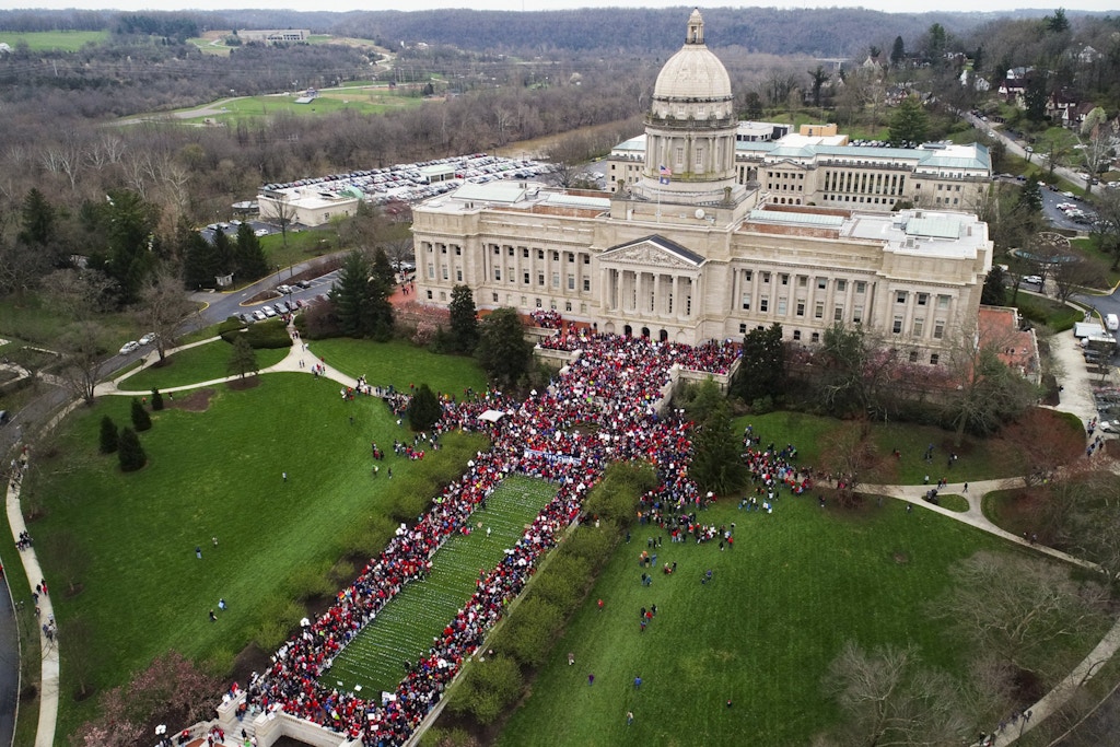 Thousands of teachers gather during a rally for education funding and changes to their pension system Monday, April 2, 2018, at the state Capitol in Frankfort, Ky. (Alex Slitz/Lexington Herald-Leader via AP)