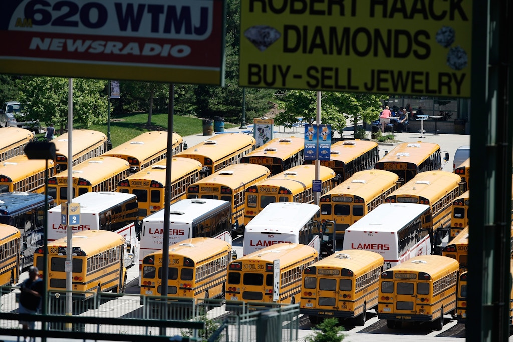 MILWAUKEE, WI - MAY 27: School buses are parked in a parking lot outside of Miller Park during the game between the Houston Astros against the Milwaukee Brewers at the Miller Park on May 27, 2010 in Milwaukee, Wisconsin. The Brewers defeated the Astros 4-3 in 10 innings. (AP Photo/Scott Boehm)