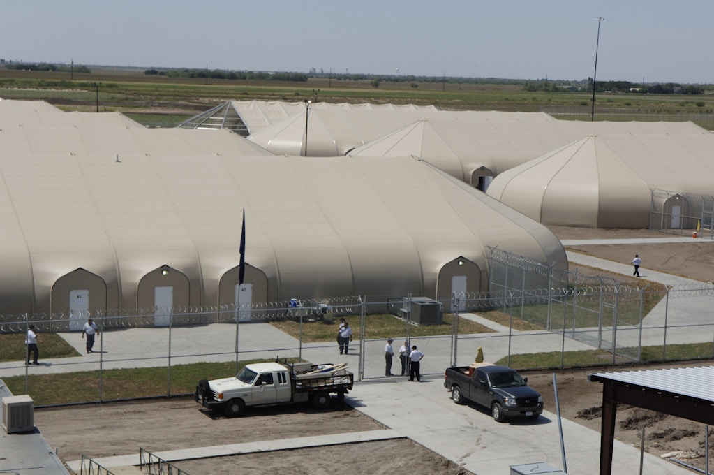 A privately-run illegal immigrant detention facility is under construction in a cotton field outside this far south Texas Willacy County town. Administered by the Immigrantions & Customs Enforcement (ICE) of the Deptartment of Homeland Security, the facility will eventually house several thousand prisoners. | Location: Raymondville, Texas, USA.  (Photo by Robert Daemmrich Photography Inc/Corbis via Getty Images)