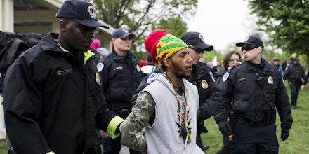 UNITED STATES - APRIL 24: U.S. Capitol Police arrest several DCMJ.org marijuana advocates after they smoked marijuana in front of the U.S. Capitol during their protest on Monday, April 24, 2017. The group held their protest to call on Congress to reschedule the drug classification of marijuana. (Photo By Bill Clark/CQ Roll Call)