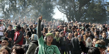SAN FRANCISCO - APRIL 20:  A cloud of smoke rests over the heads of a group of people during a 420 Day celebration on 