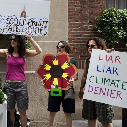 NEW YORK, NY - JUNE 20:  Environmental activists protest outside of the Harvard Club where Environmental Protection Agency (EPA) Administrator Scott Pruitt was scheduled to speak, June 20, 2017 in New York City. Pruitt abruptly cancelled his appearance, where he was supposed to discuss the United States' environmental role in the world following the decision to withdraw the United States from the Paris Climate Accord. (Photo by Drew Angerer/Getty Images)
