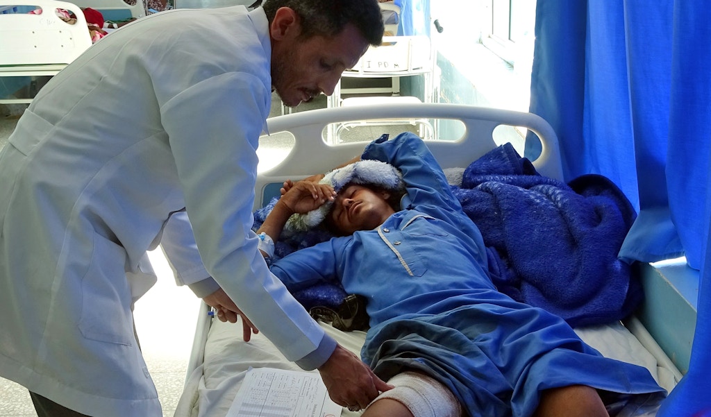 A Yemeni man, injured in an air raid on a wedding party in Yemen, receives treatment at a hospital in Yemen's Hajjah province on April 23, 2018. - Dozens were killed and wounded in an air raid on a wedding party in Yemen, local officials said Monday, with Huthi rebels blaming a Saudi-led military coalition. (Photo by ESSA AHMED / AFP)        (Photo credit should read ESSA AHMED/AFP/Getty Images)