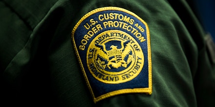 WASHINGTON, DC - DECEMBER 5: A  U.S. Customs and Border Protection patch is displayed on the sleeve of Ronald D. Vitiello, Acting Deputy Commissioner of U.S. Customs and Border Protection (CBP), as he speaks during a Department of Homeland Security press conference to announce end-of-year numbers regarding immigration enforcement, border security and national security, December 5, 2017 in Washington, DC. (Photo by Drew Angerer/Getty Images)