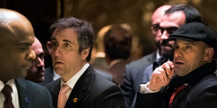 NEW YORK, NY - DECEMBER 12: Michael Cohen (3rd from L), personal lawyer for President-elect Donald Trump, gets into an elevator in the lobby at Trump Tower, December 12, 2016 in New York City. President-elect Donald Trump and his transition team are in the process of filling cabinet and other high level positions for the new administration. (Photo by Drew Angerer/Getty Images)